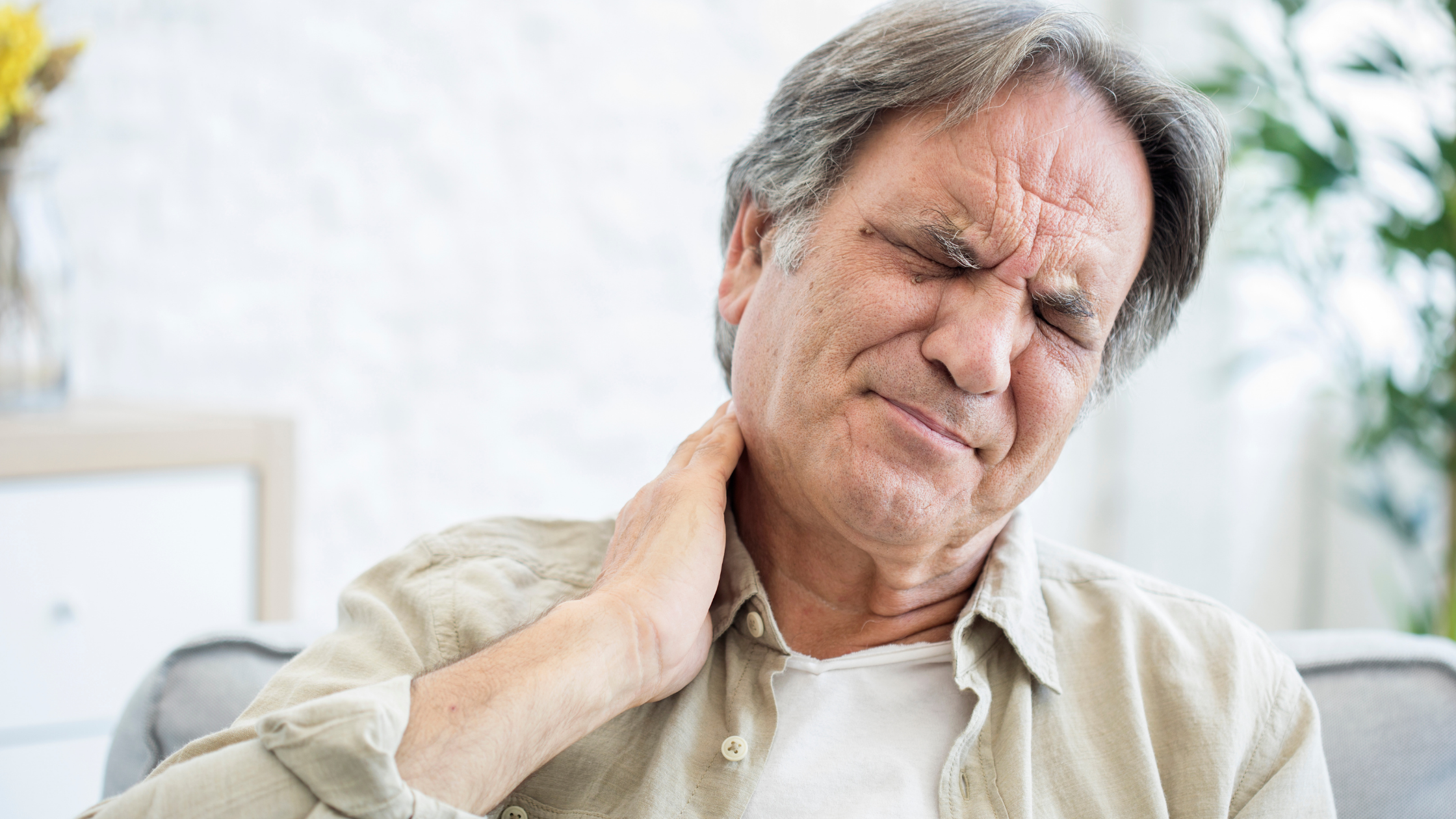 man with chronic neck pain