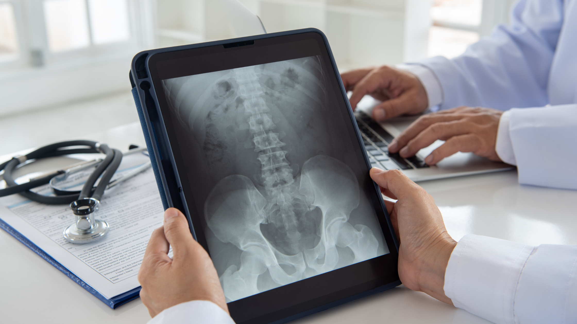 imaging tests for spine pain on tablet