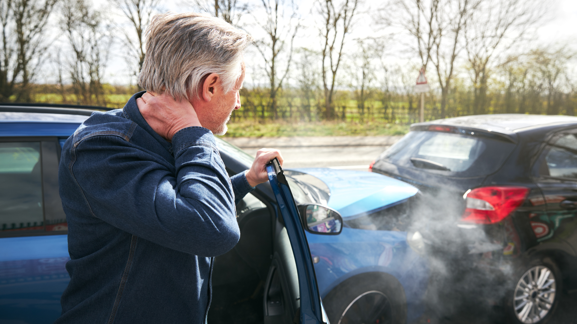 man with pain after accident or injury