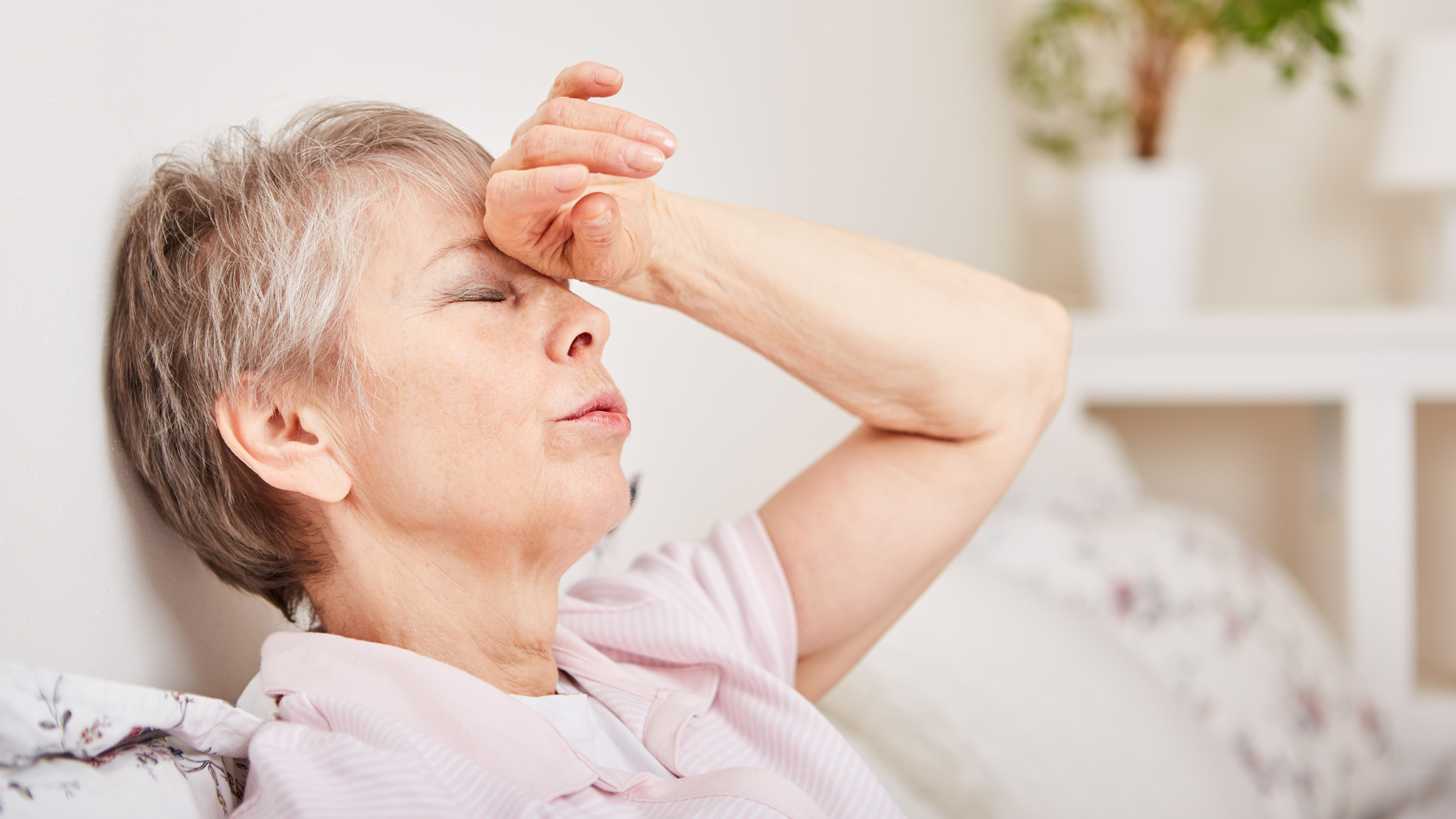 woman with chronic pain and nausea